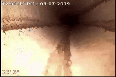 HD sewer camera inspection in progress showing real-time video feed of pipe interior conditions