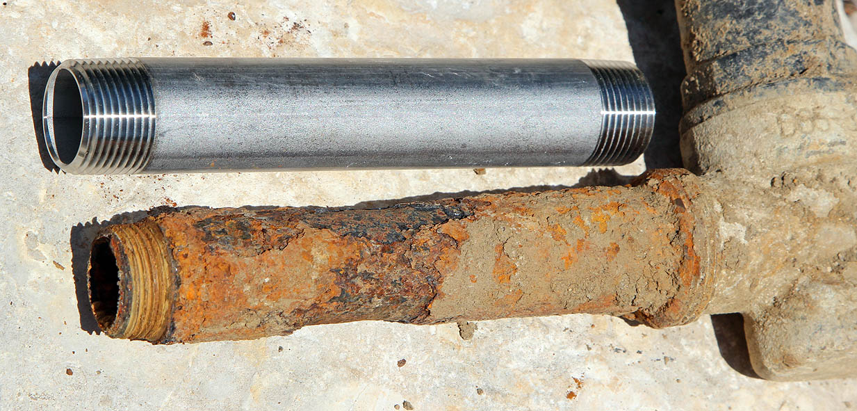 New vs. Corroded Galvanized Pipe
